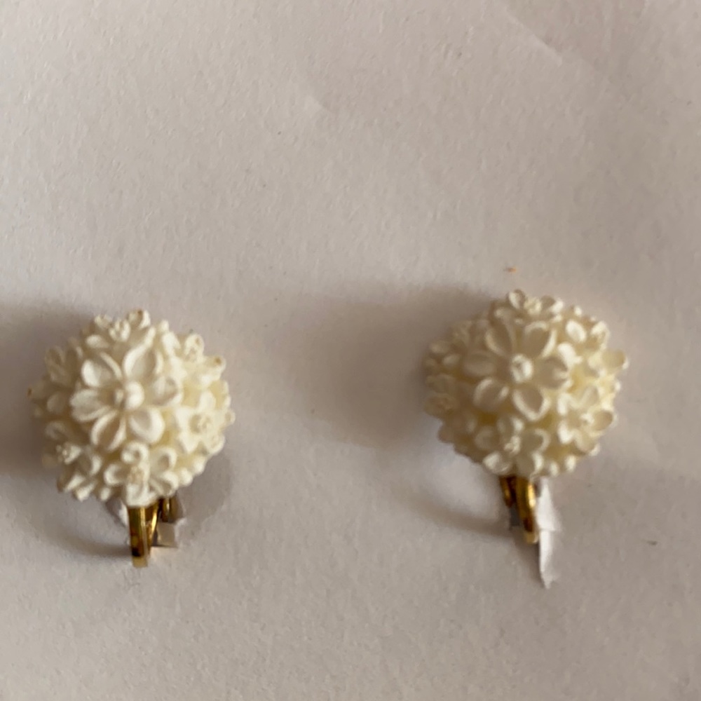 White Carved Multi Flower on Gold Tone Clip Back